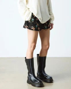 Boots Buzz Hi en cuir Gloss in Noir