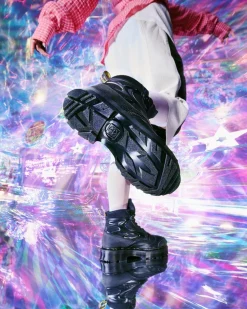 Boots EXOSHIELD XX01 en cuir à bout en acier in Noir