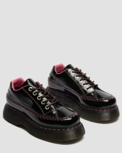Chaussures Buzz en cuir Distressed Patent à 5 œillets in Noir